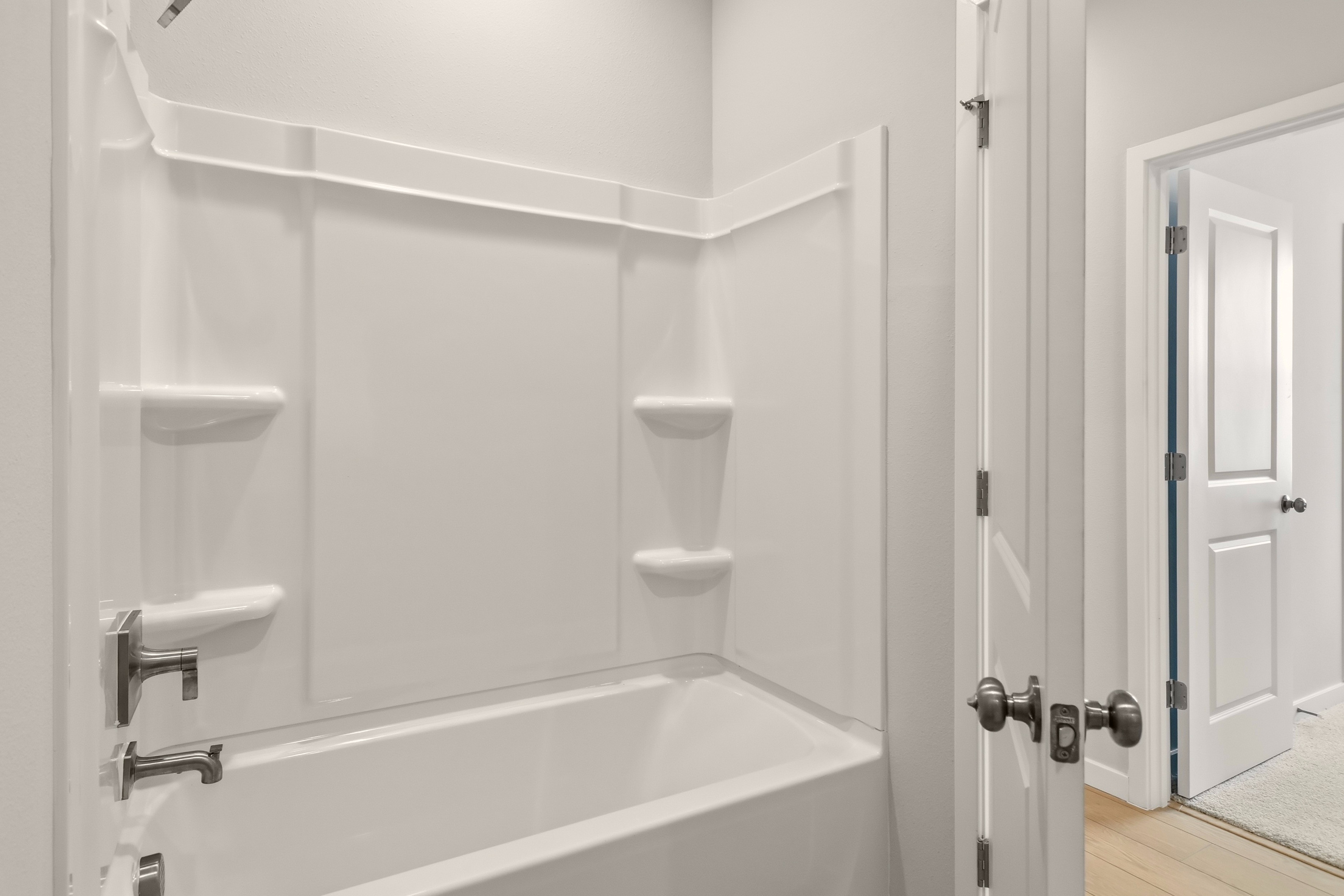 A bathroom with a toilet and sink.
