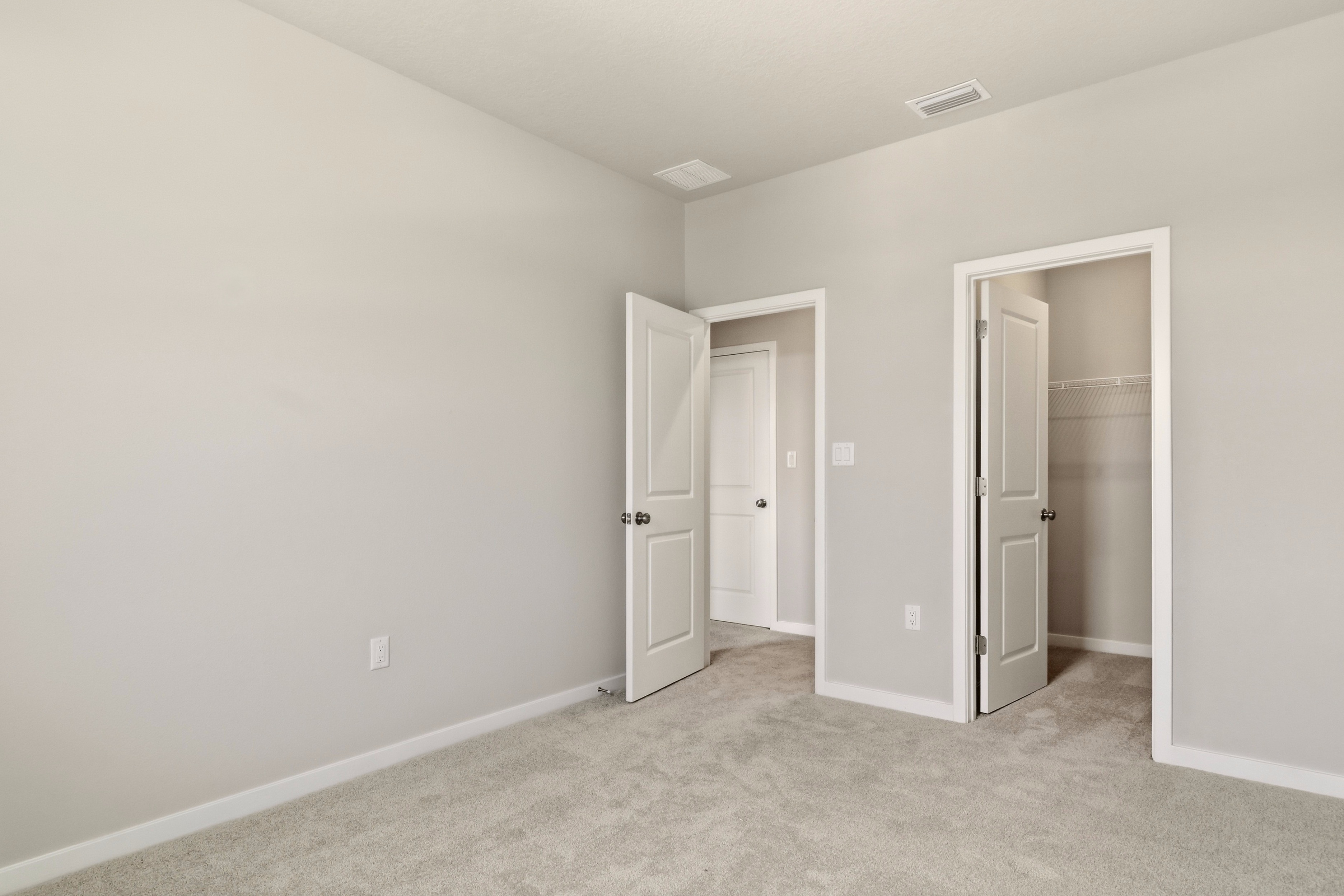 A room with white doors.