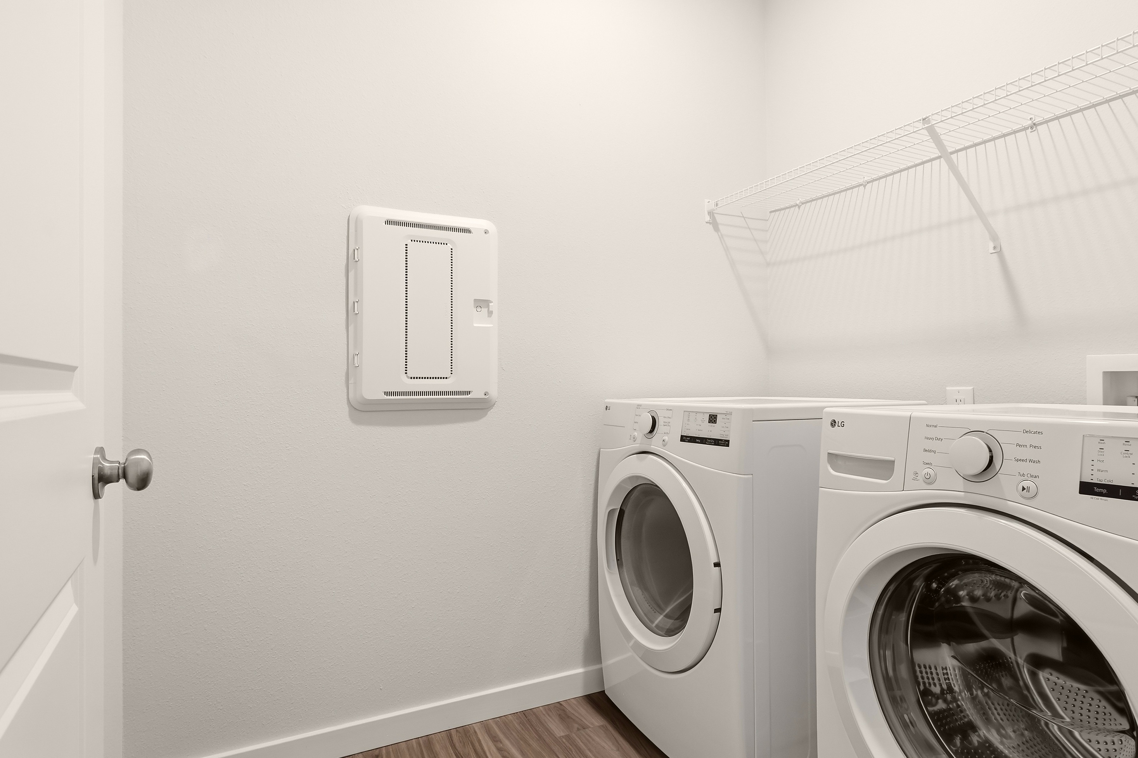 A white washing machine and dryer.
