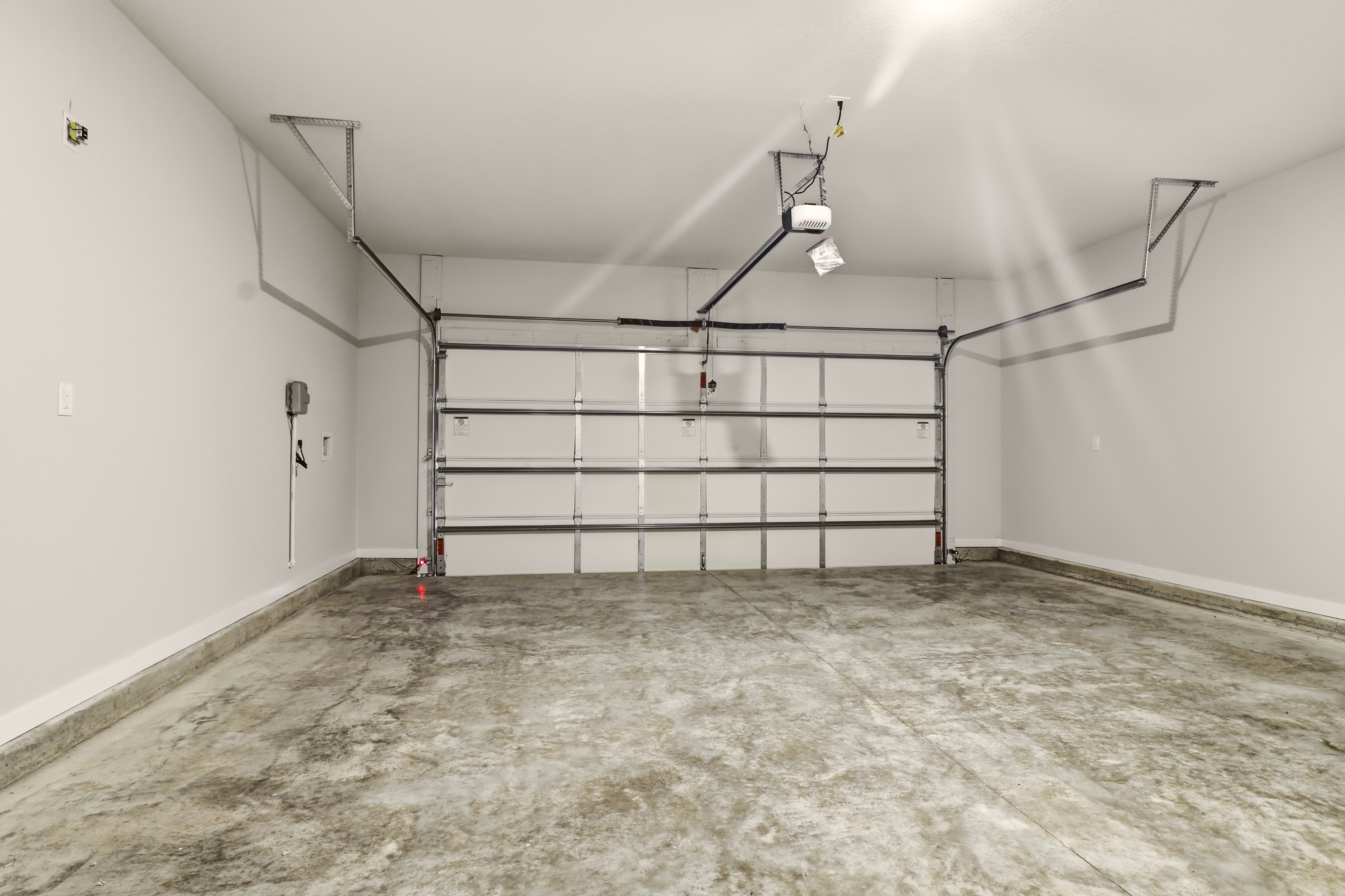 A room with a metal gate.