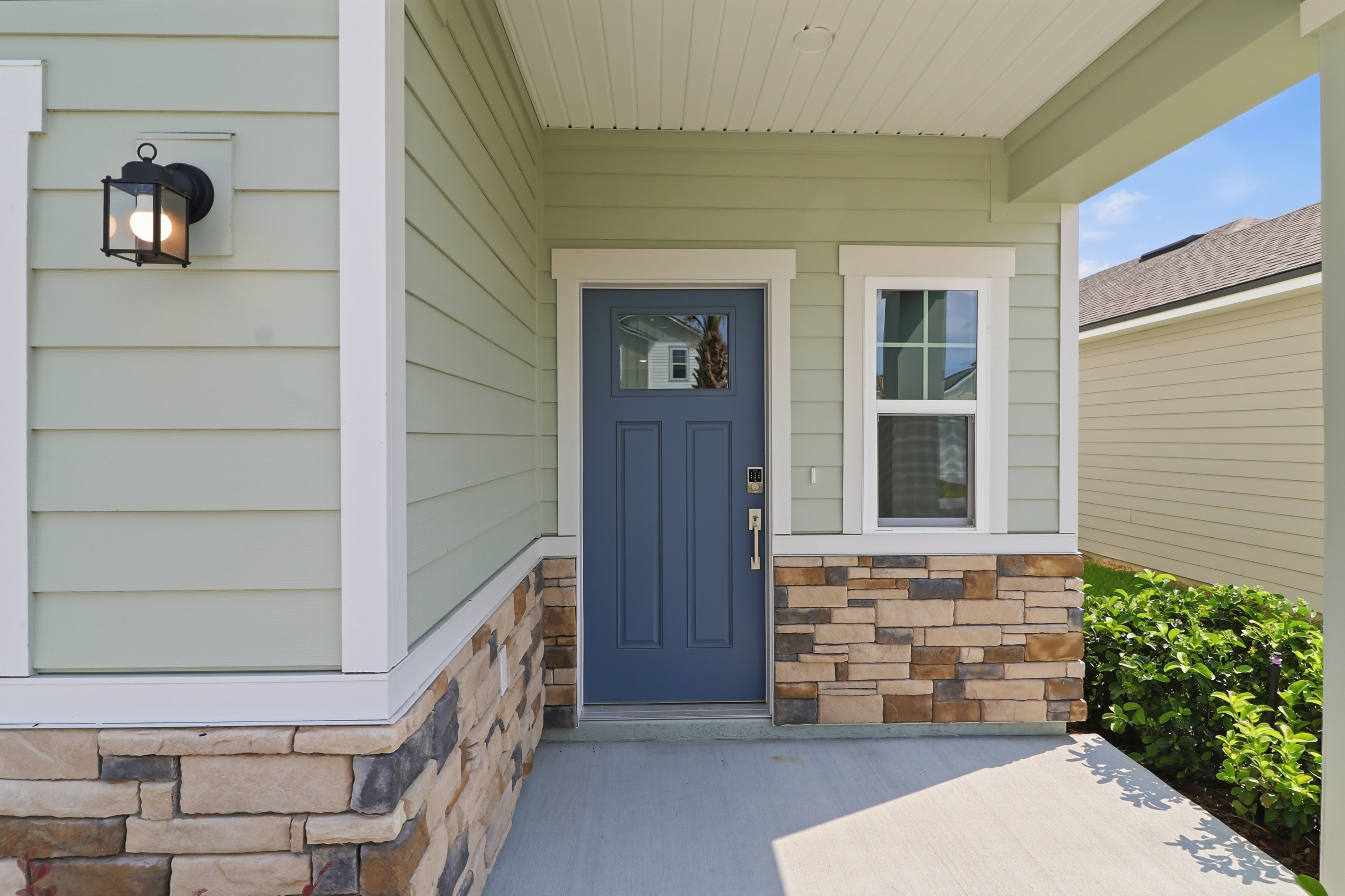 A house with a blue door.