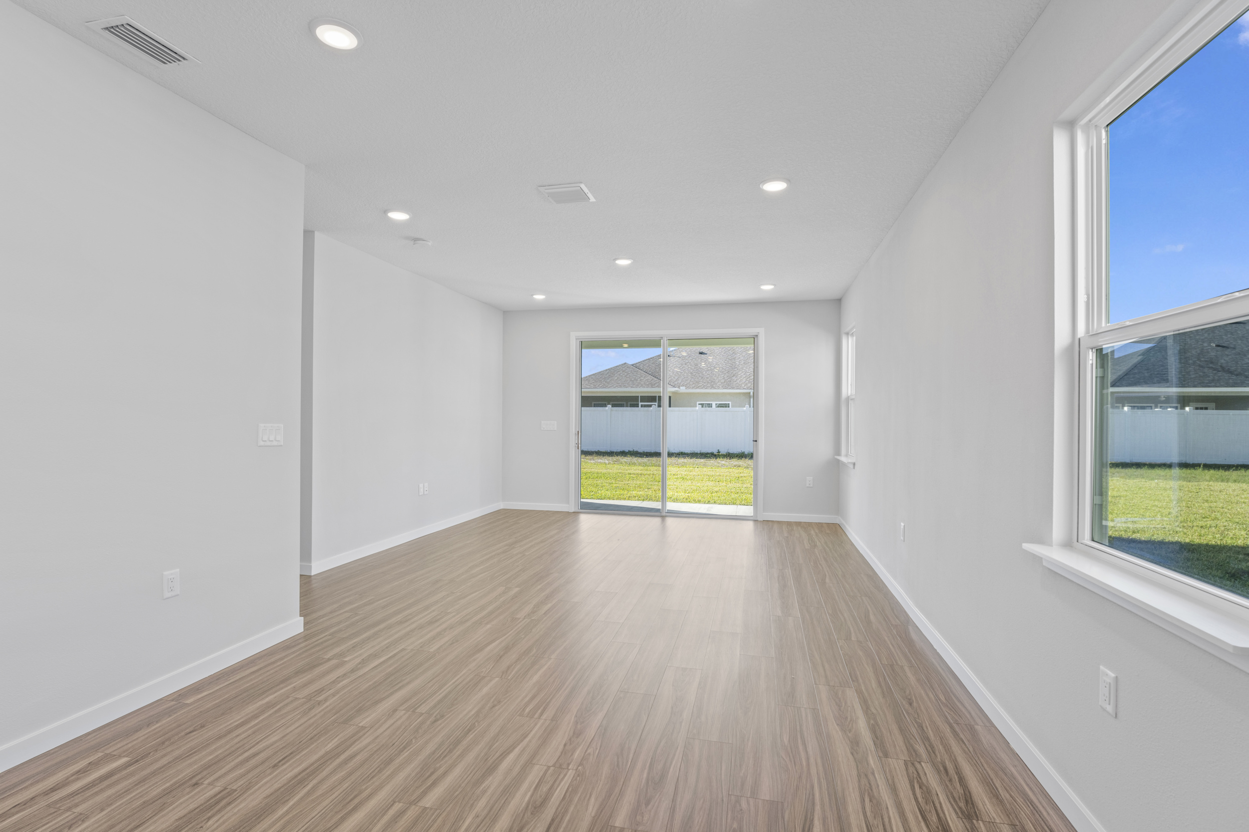 Lot 21 Living and Dining Area Overlooking Patio at Camden Woods in Kingsland