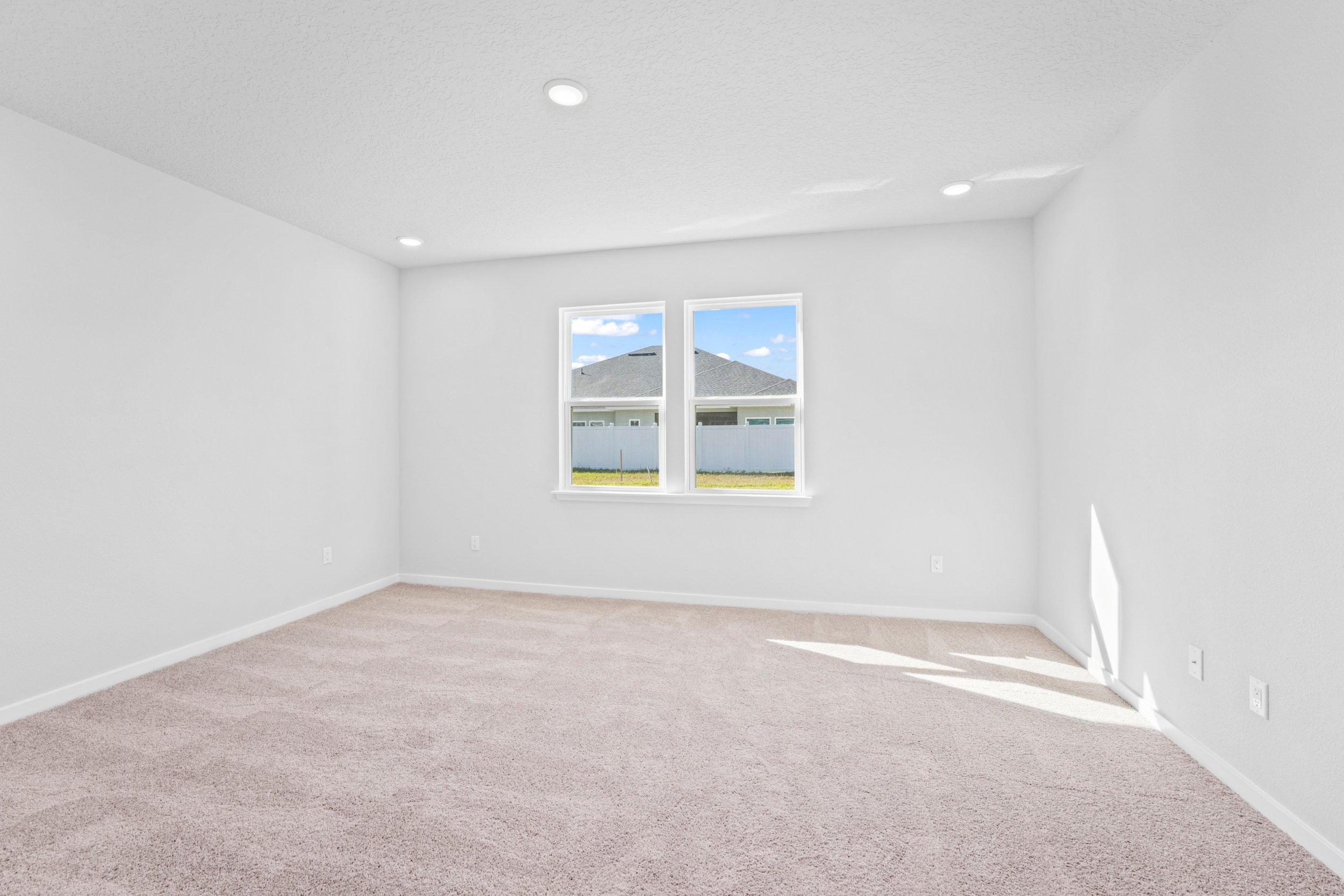 Lot 22 Primary Bedroom with Natural Light at Camden Woods in Kingsland