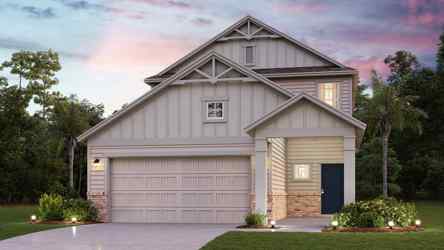 A house with a driveway with American Gothic House in the background.
