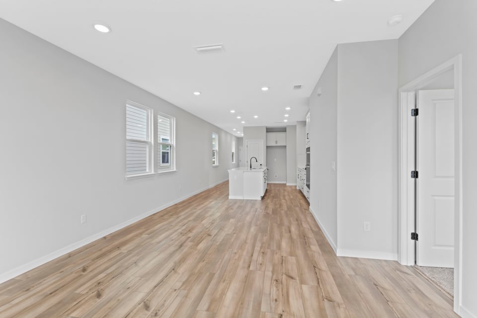 Miramar Floorplan Lot 81 Living Room area overlooking Kitchen at Concourse Crossing in Fernandina Beach