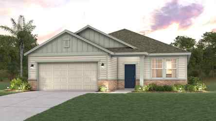 A house with a garage and a lawn in front of it.