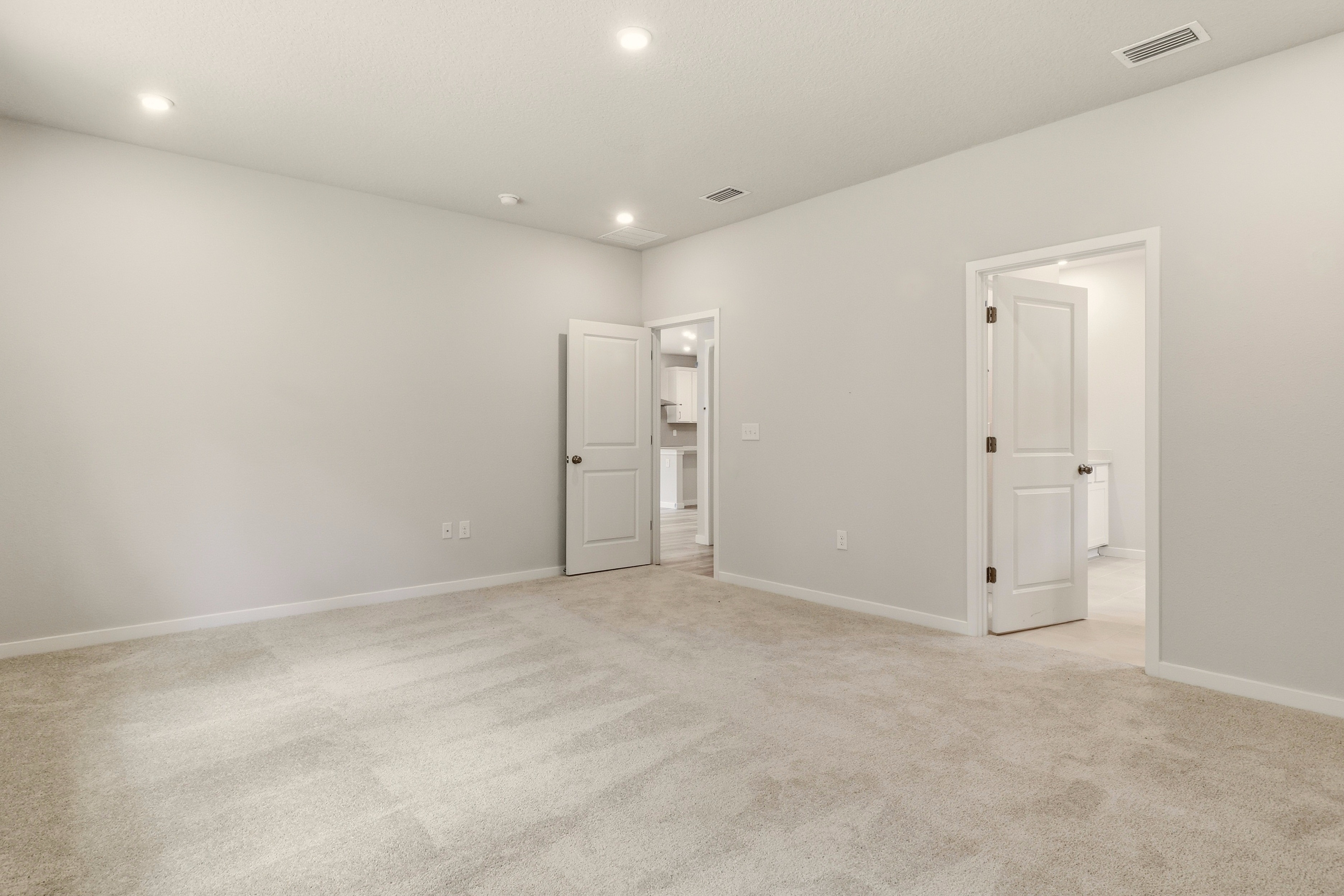 A room with white doors.