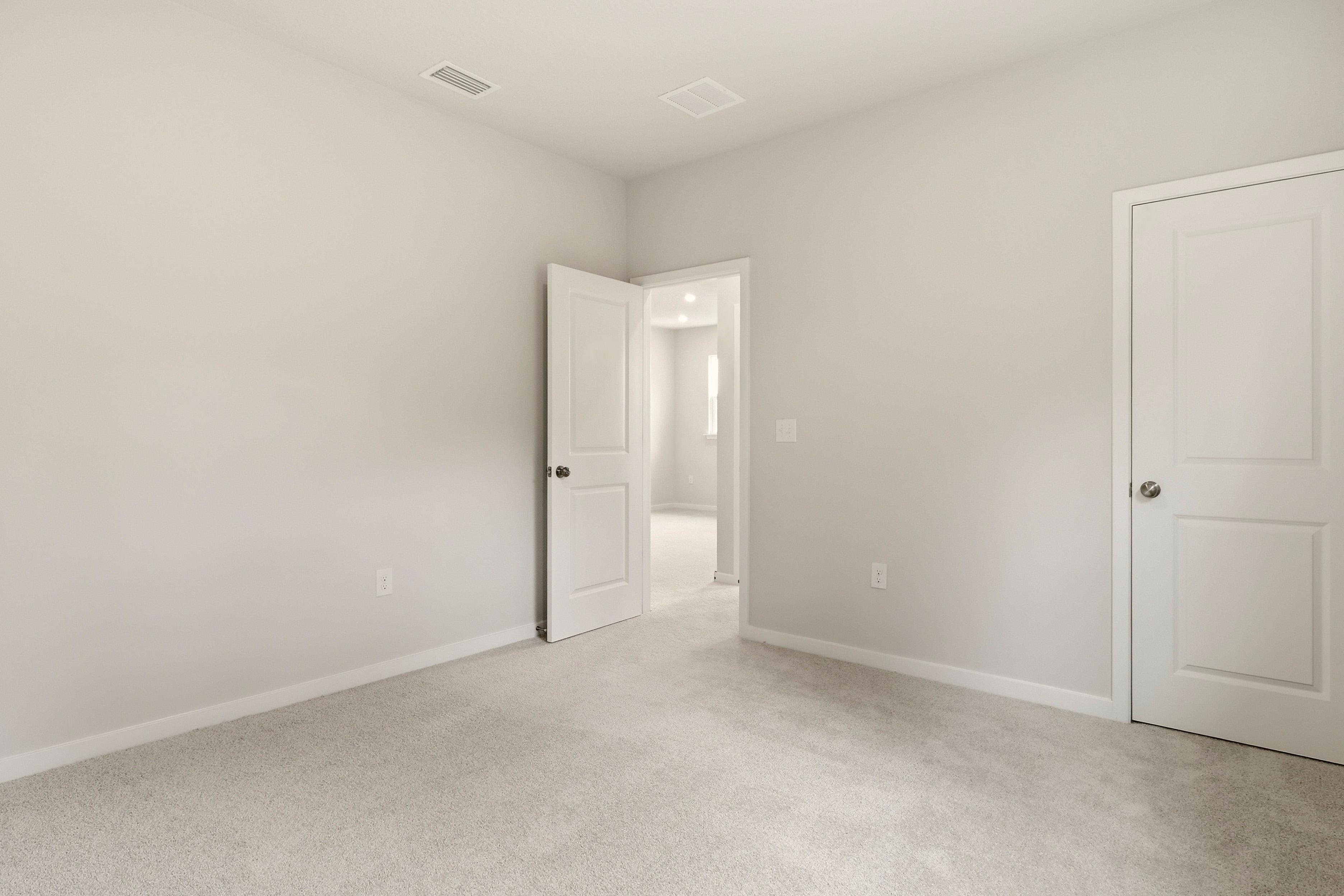 A room with white doors.