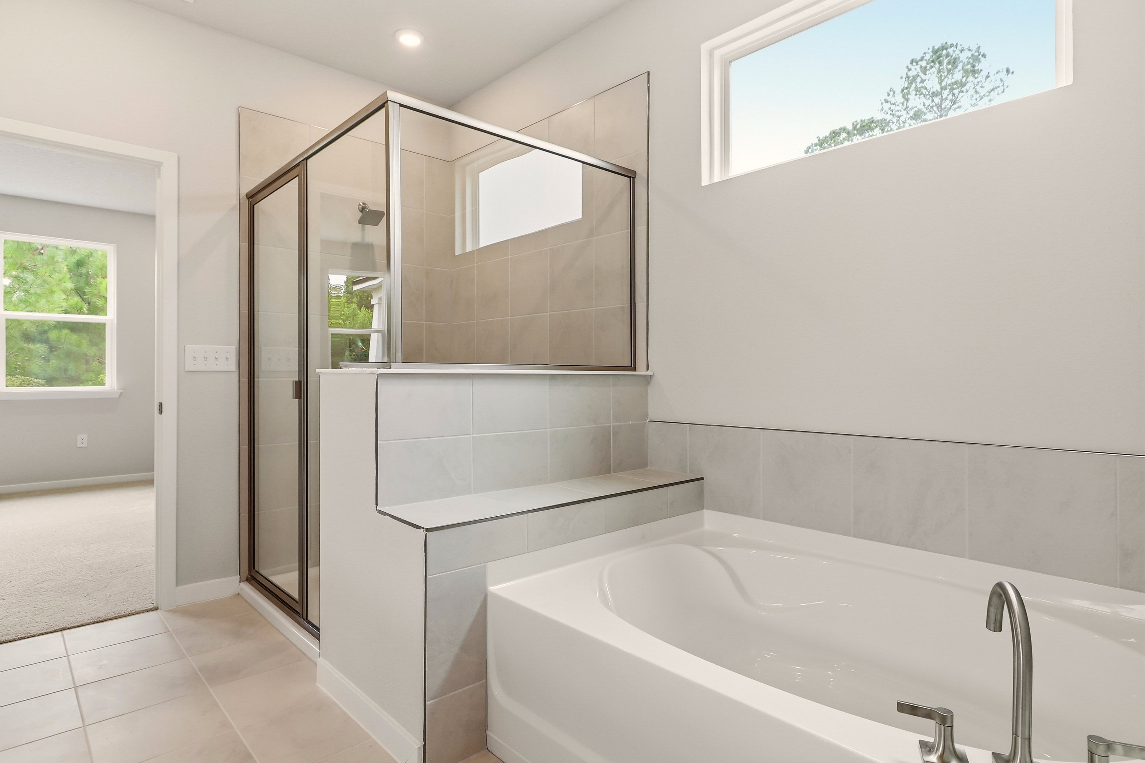 A bathroom with a glass shower.