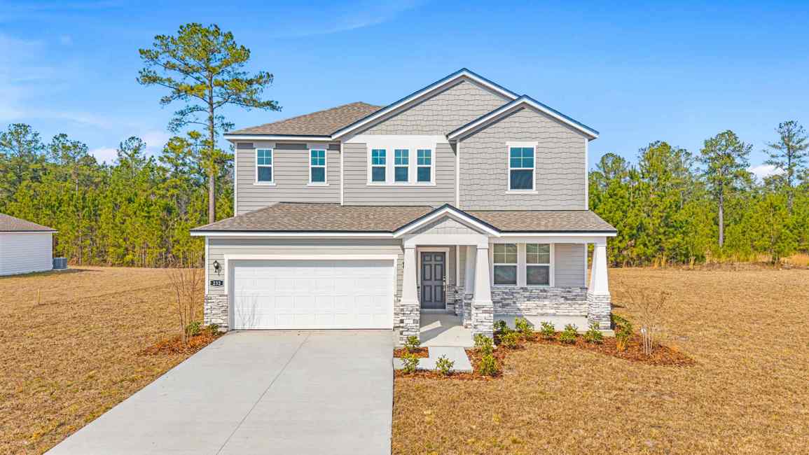 Lot 533 Front Exterior with Large Patio and Brick at NorthShore