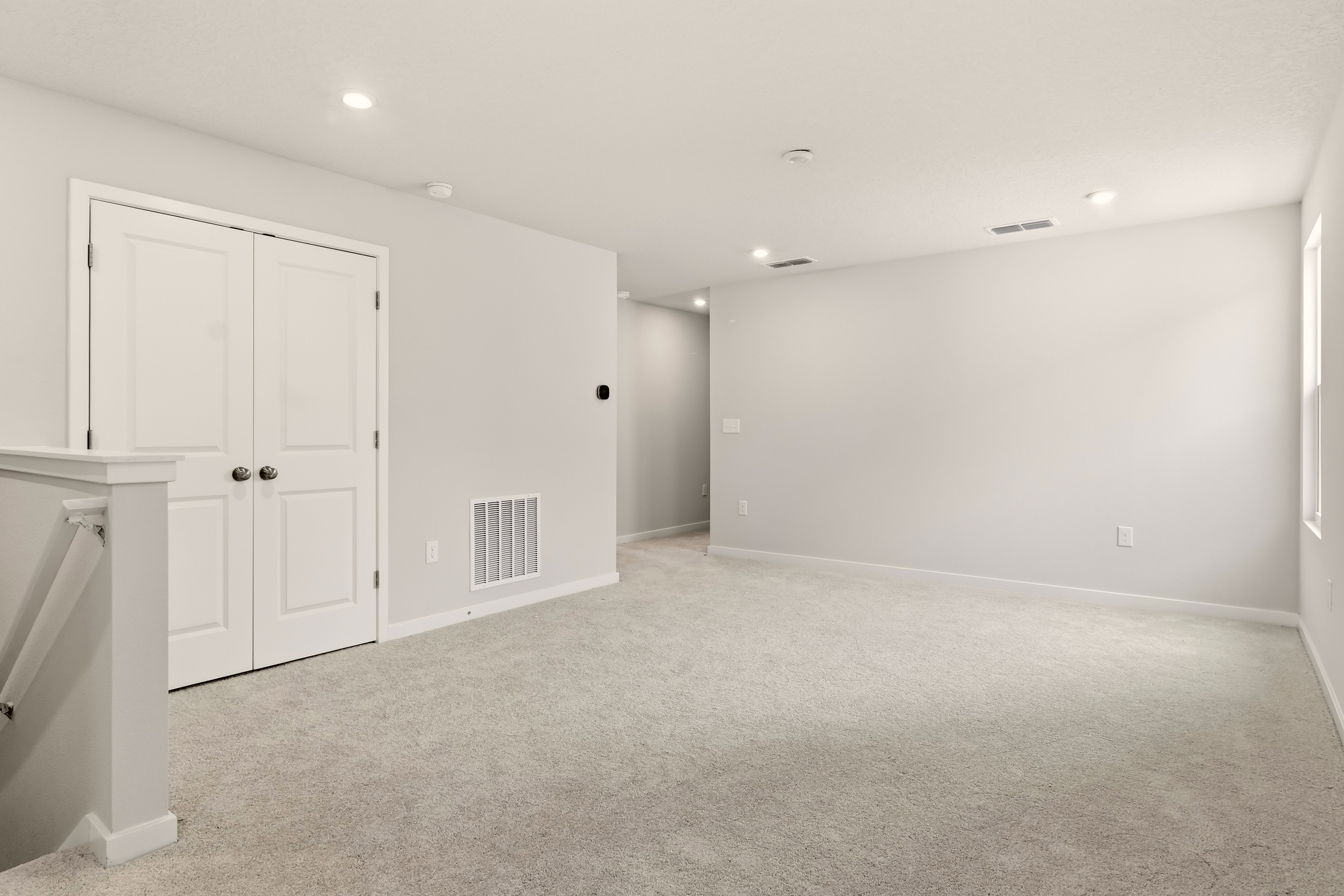 A room with white doors.