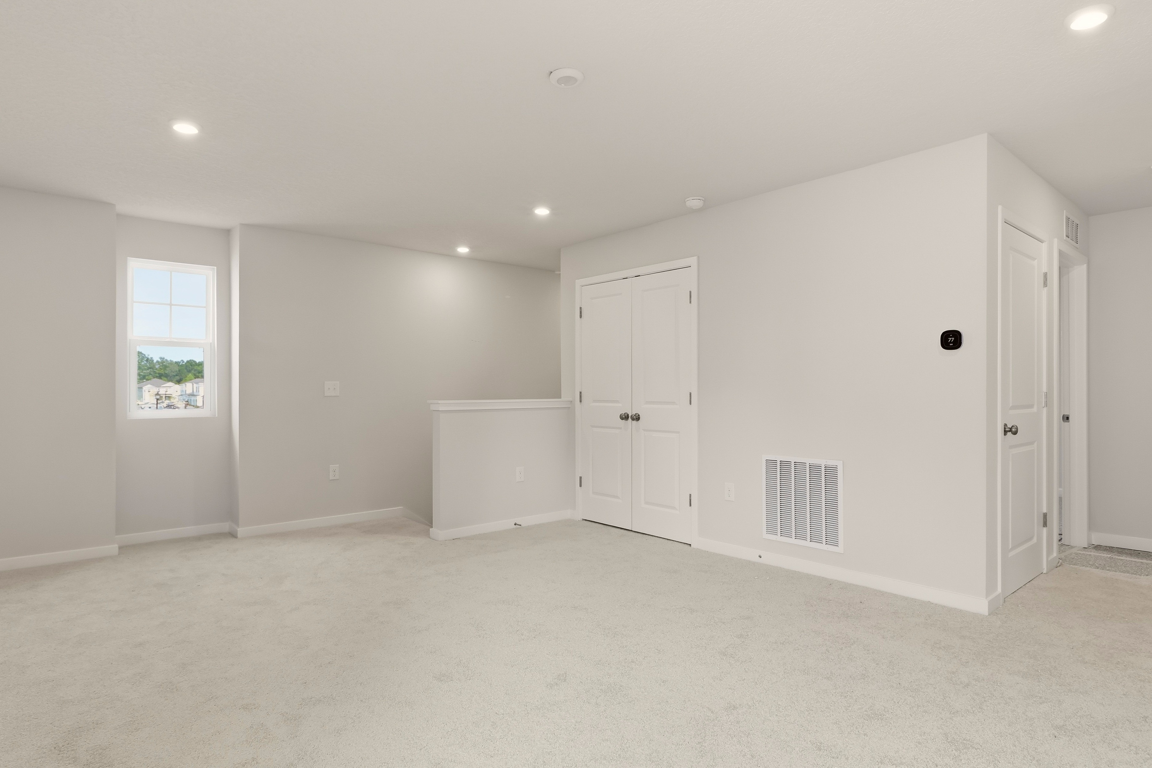 A room with white doors.