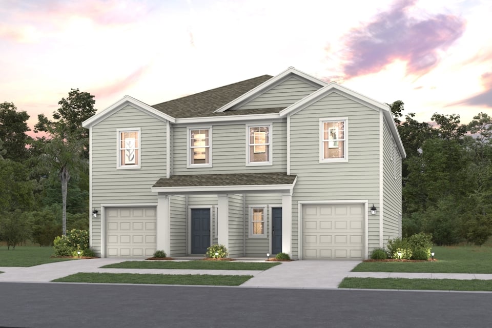 A house with garages and trees.