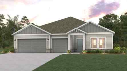 A house with a garage and a lawn in front of it.