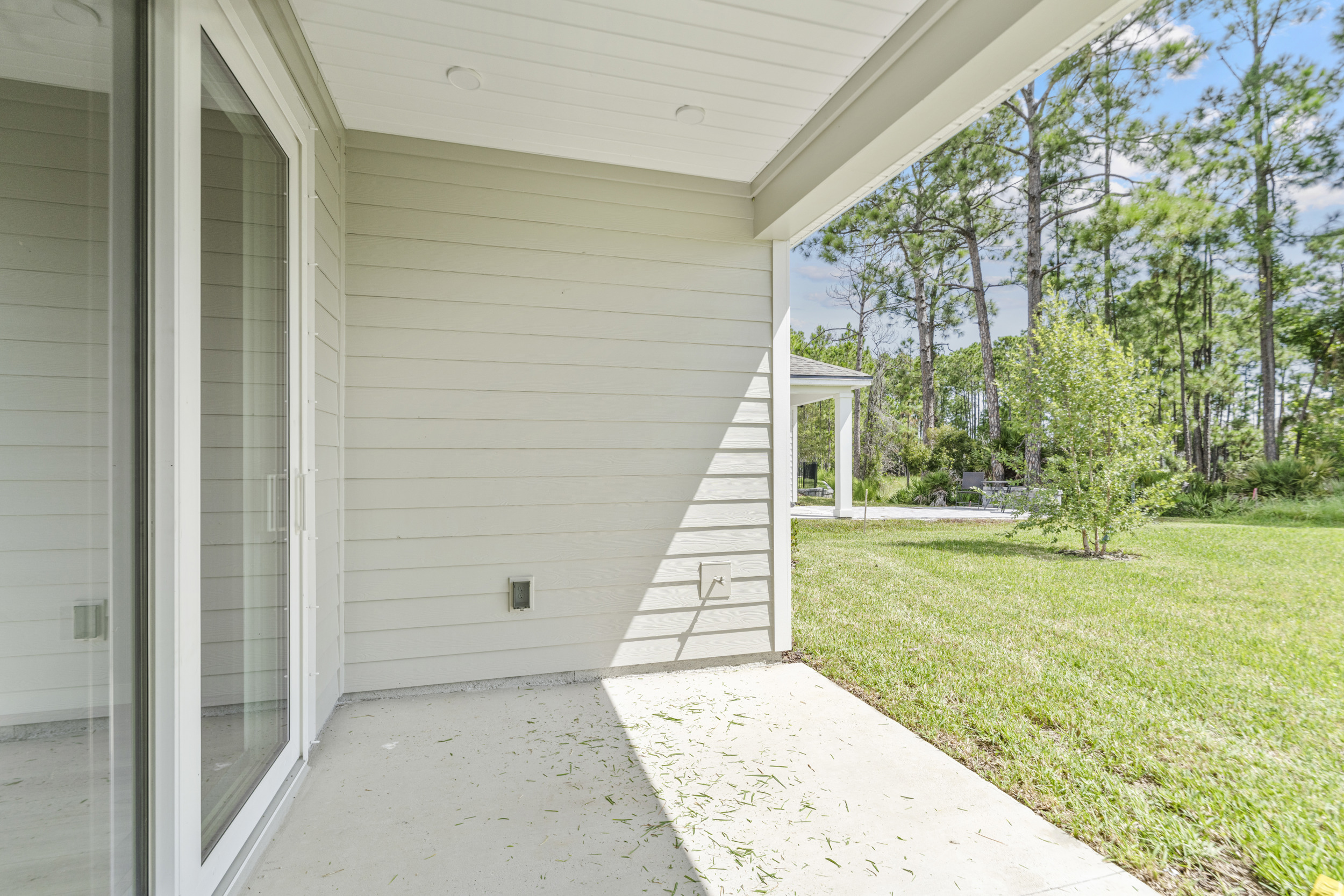 A house with a grass yard.