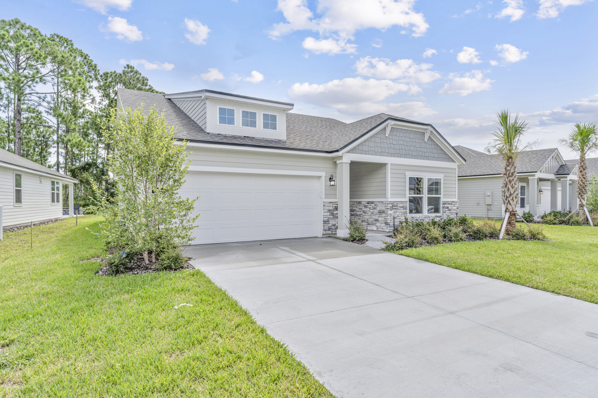 A house with a driveway.