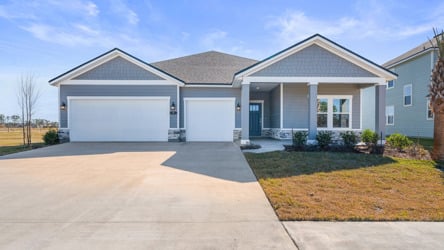 Lot 46 Front Exterior with 3 Bay Garage and Brick at Reserve East