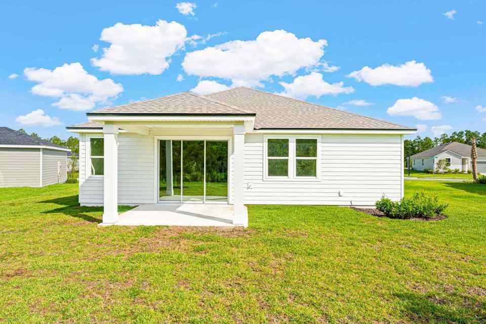 Charleston II Lot 123 Rear Exterior with Covered Patio at Seminole Palms in Palm Coast