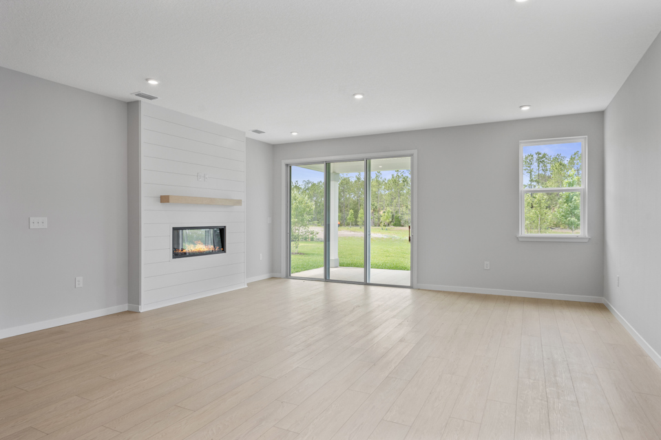 Charleston II Floorplan Lot 50 Great Room with Fireplace at Seminole Palms in Palm Coast