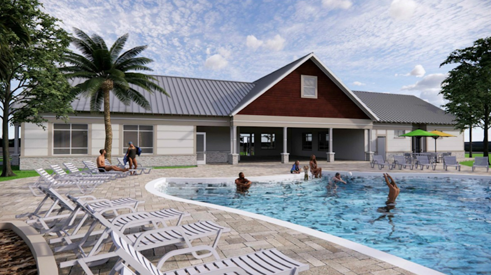 A group of people in a swimming pool.