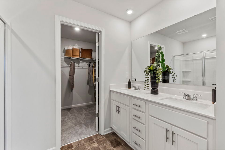 A bathroom with a glass shower.