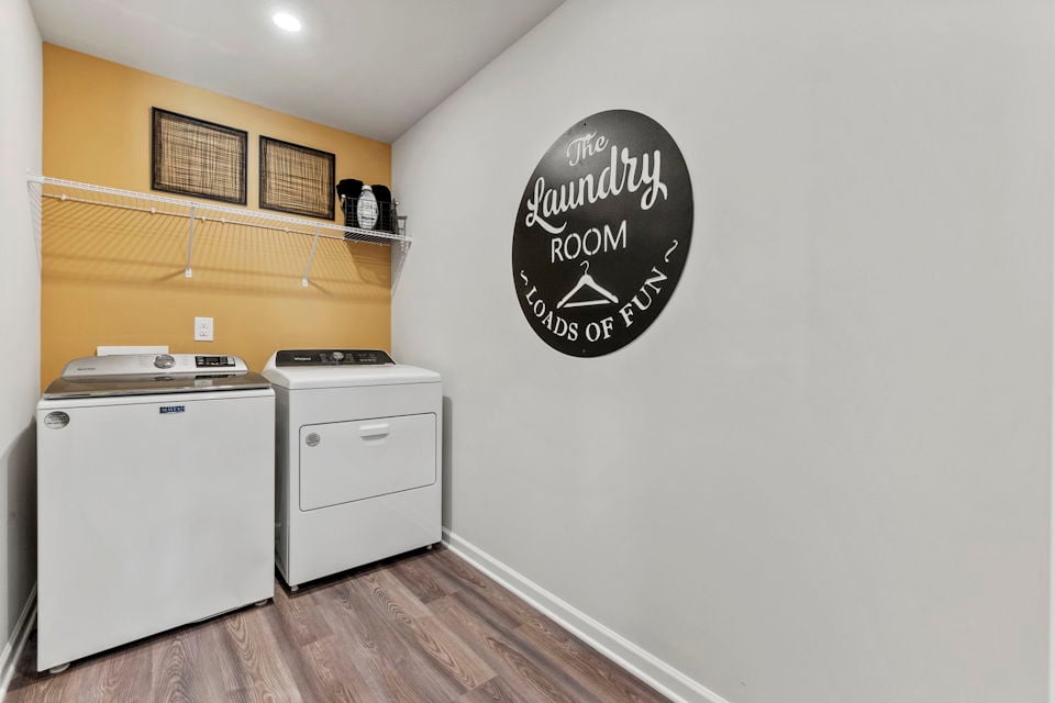 A room with a wall with a sign on it.