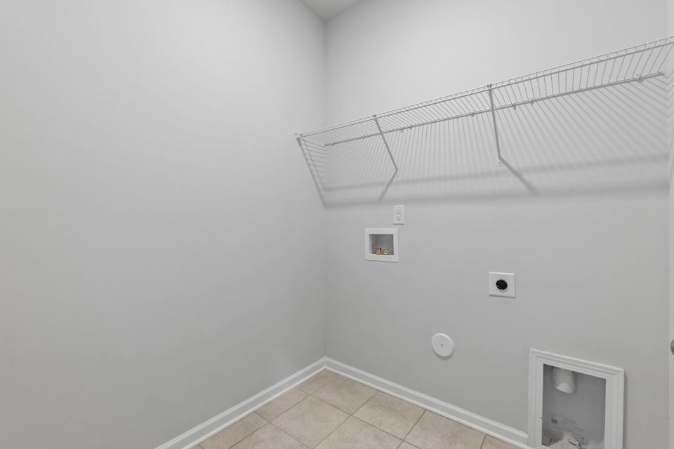 A white wall with a vent and a vent.