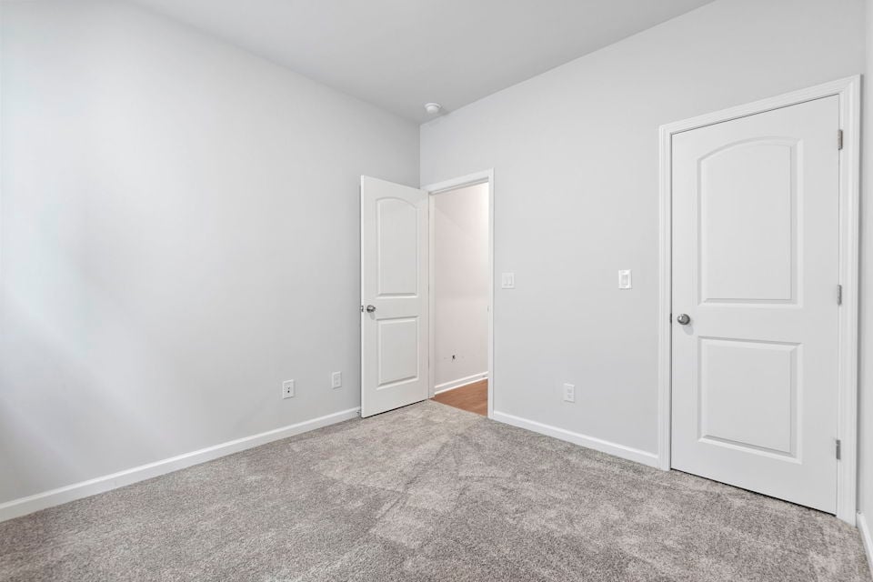 A room with white doors.