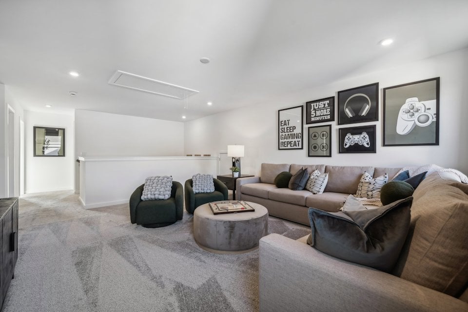 A living room with a couch and a coffee table.