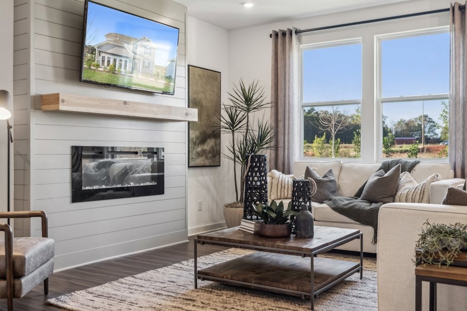 A living room with a fireplace.