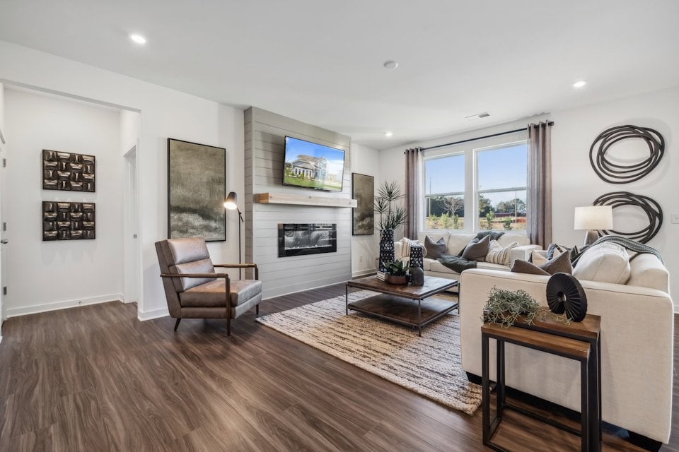 A living room with a fireplace.