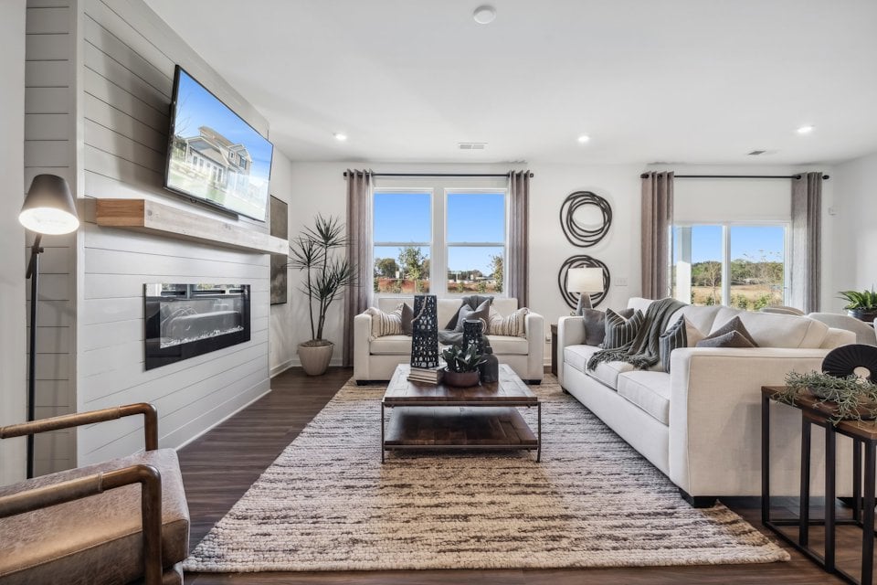 A living room with a fireplace.