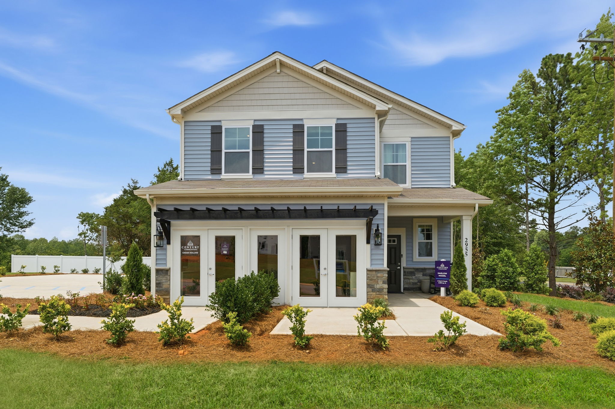A house with a lawn in front.