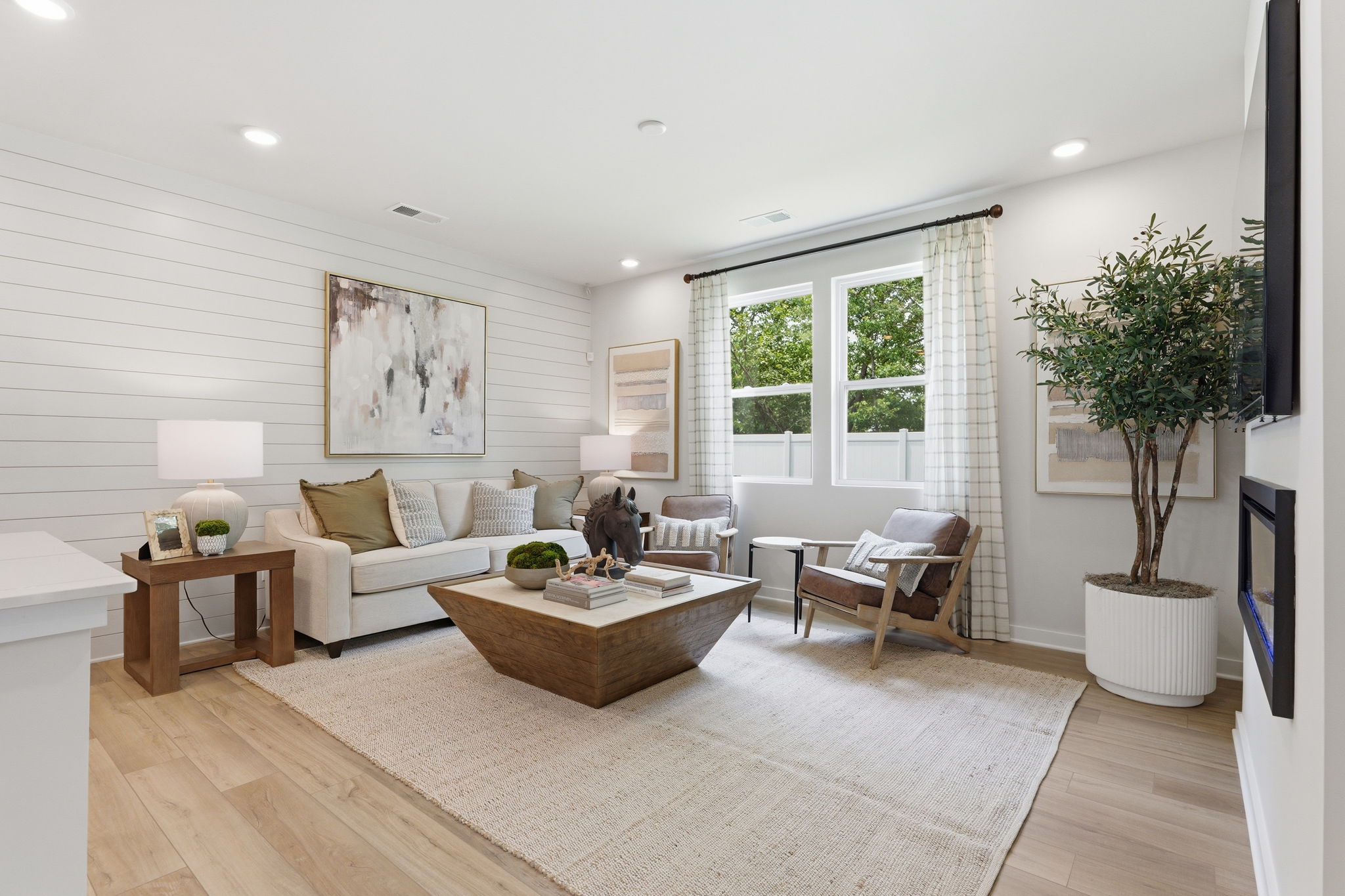 A living room with a rug and a rug.