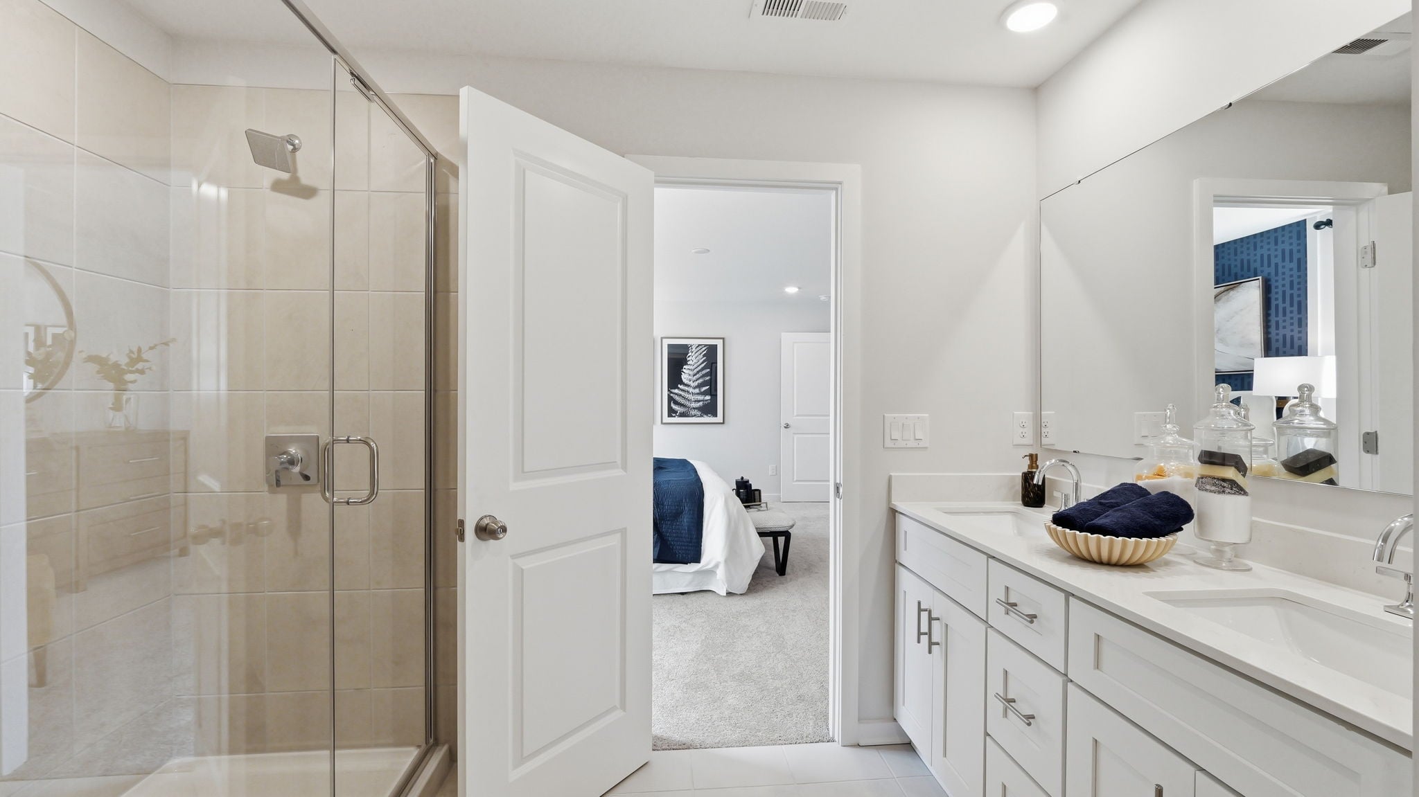 A bathroom with a glass shower.
