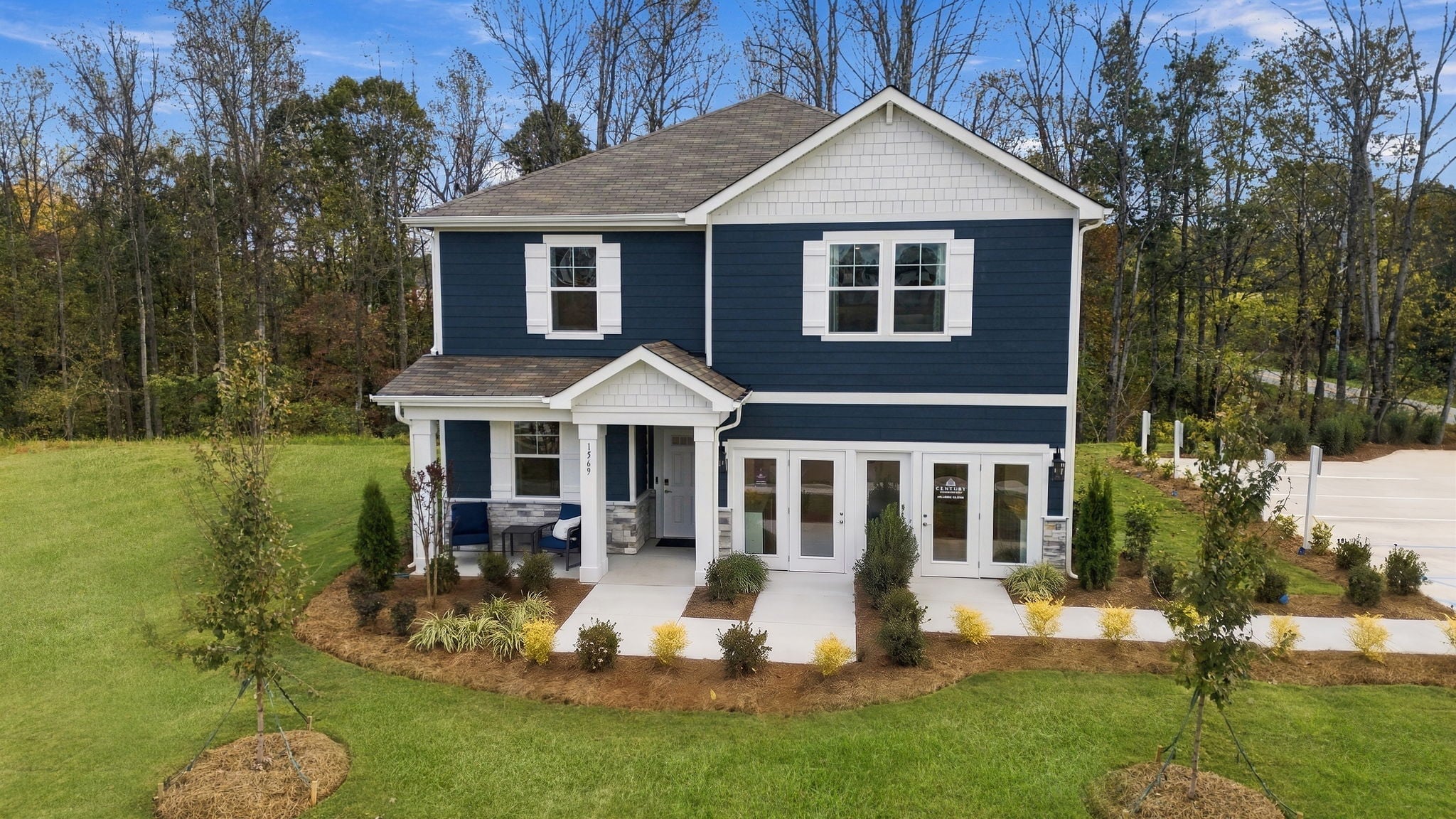 A house with a yard and trees.