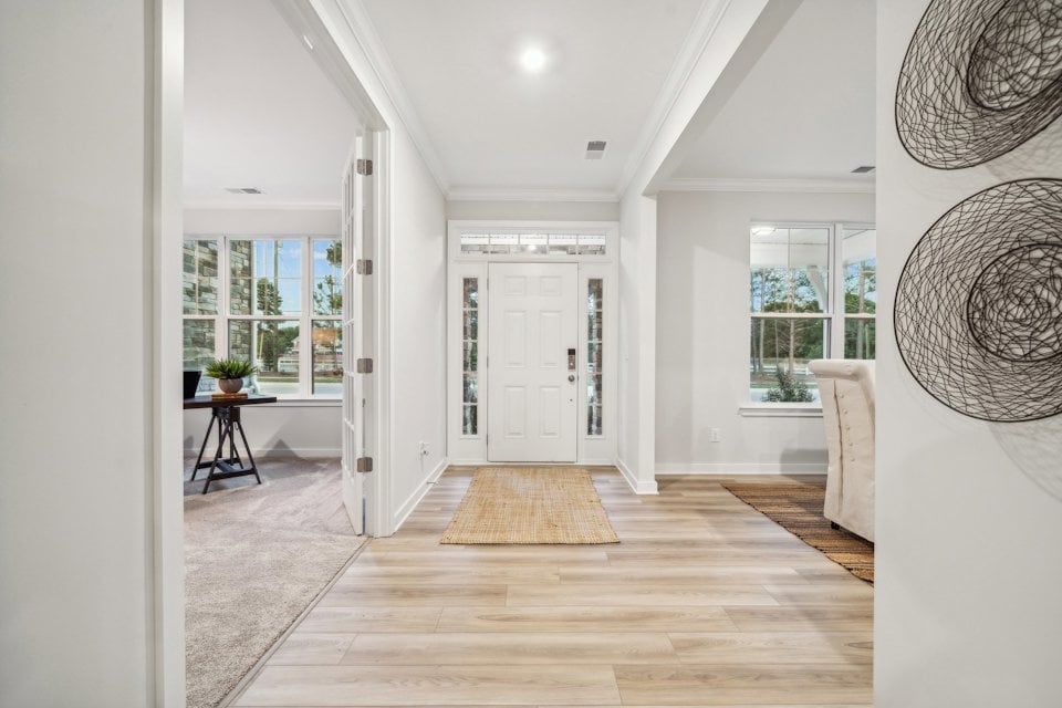 A room with a wood floor and a wood floor.