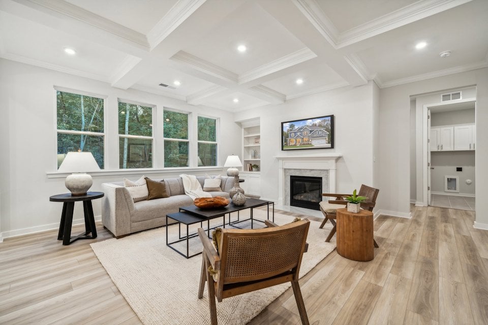 A living room with a fireplace.