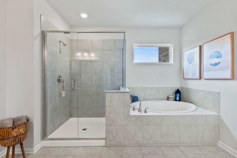 A bathroom with a glass shower.