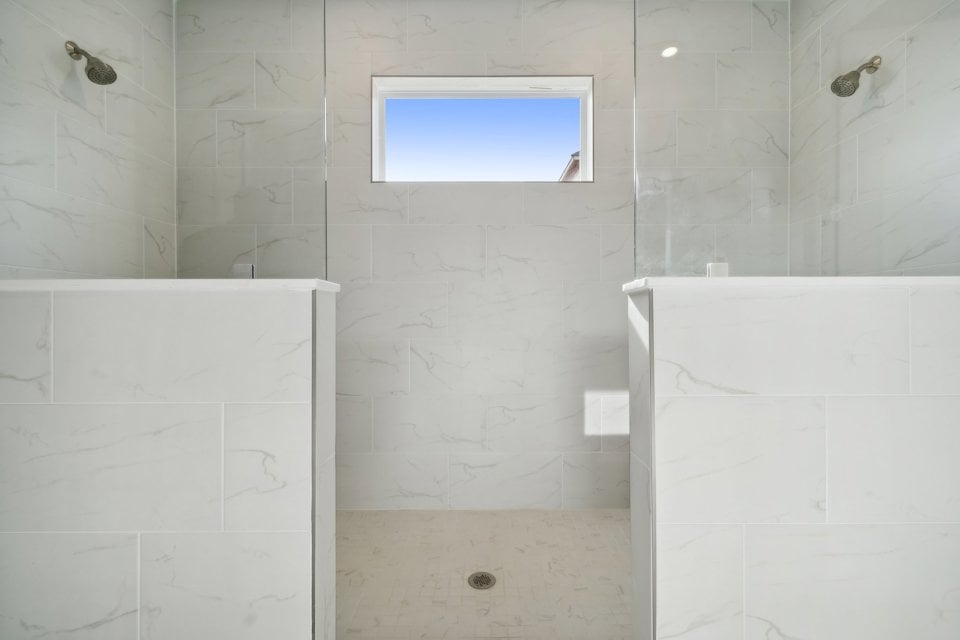 A bathroom with a window.
