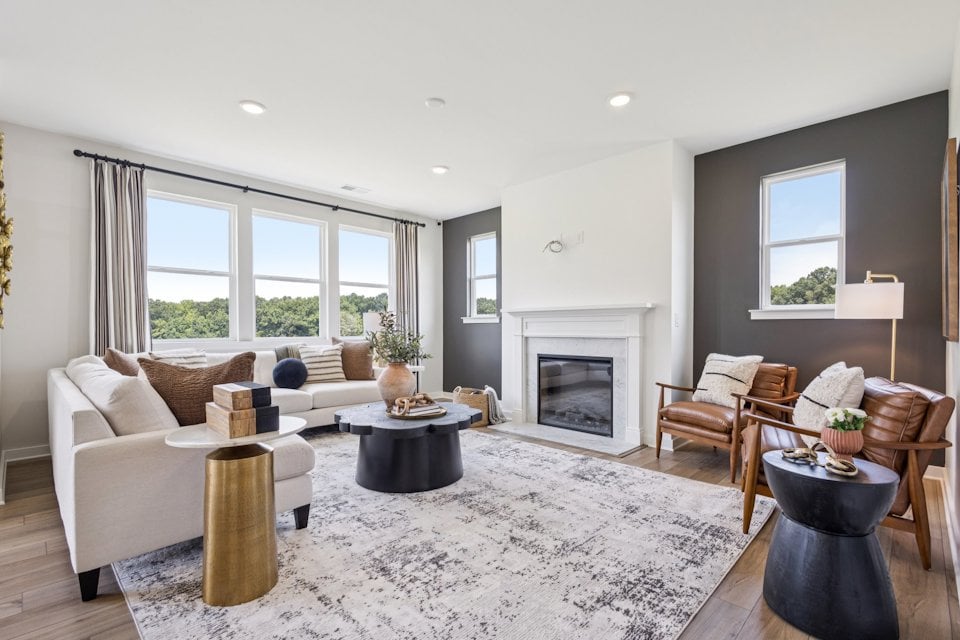 A living room with a fireplace.