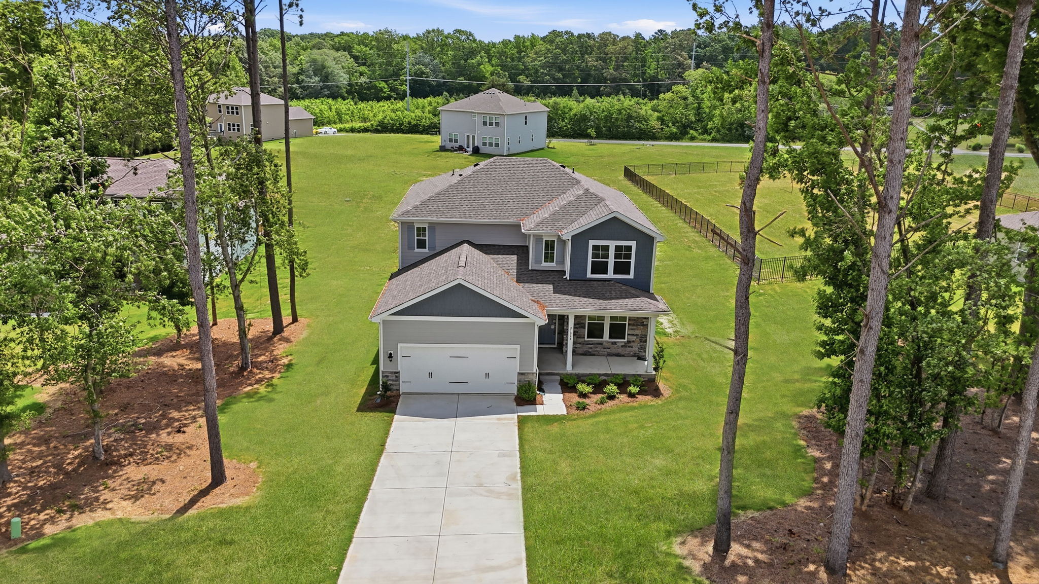 A house surrounded by trees.