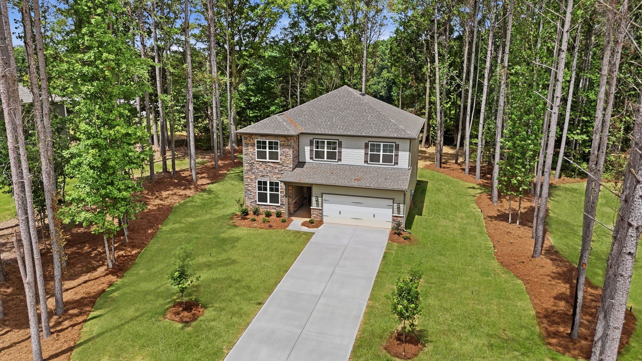 A house in a wooded area.