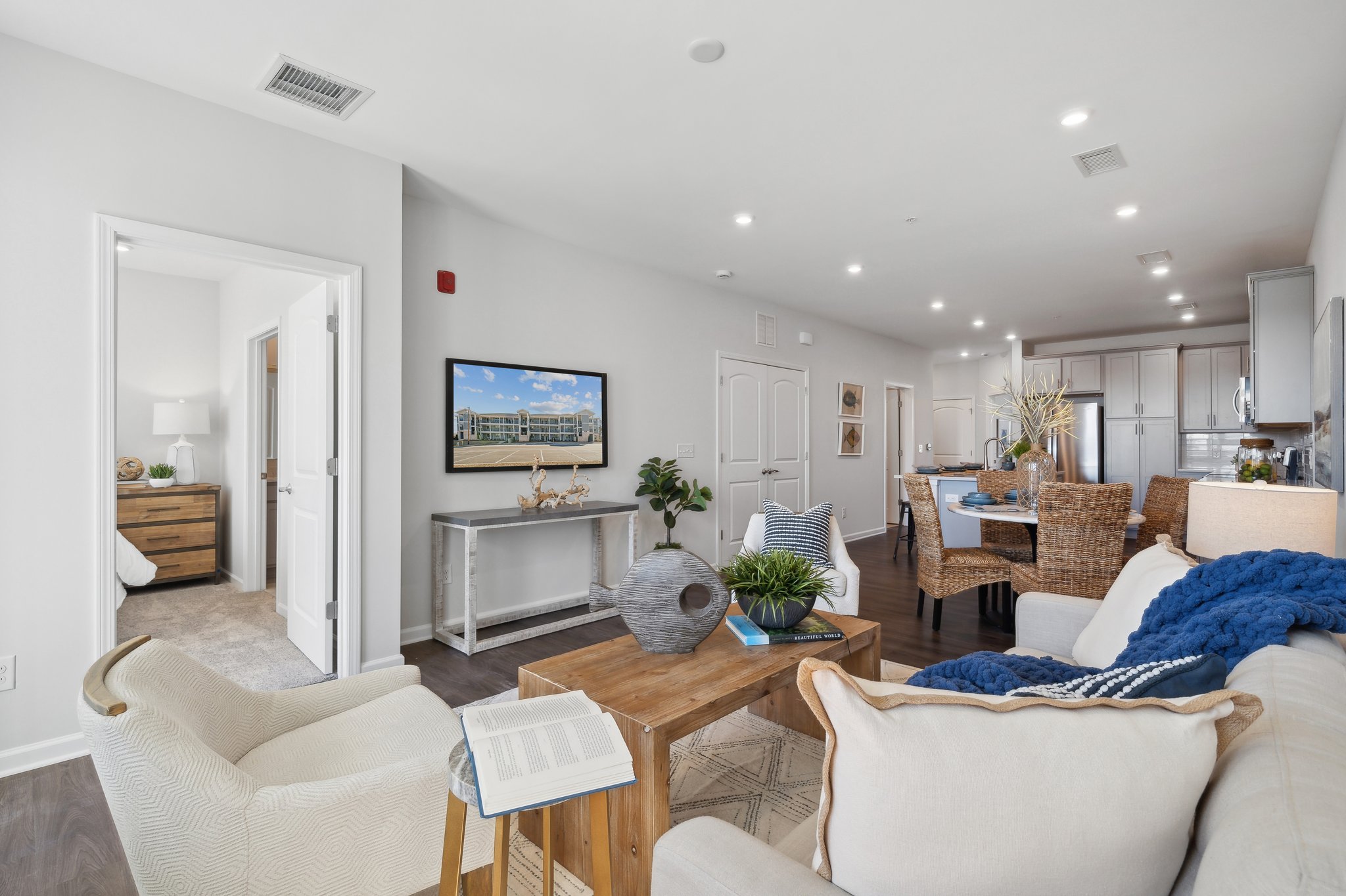 A living room with a tv and couches.