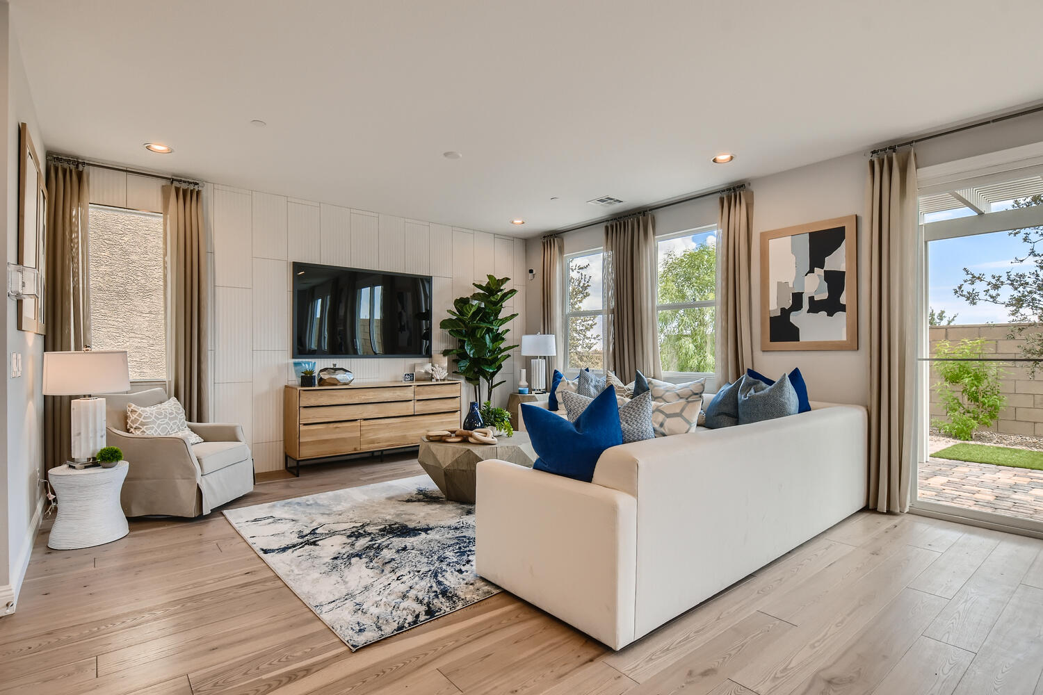 A living room with a large window.