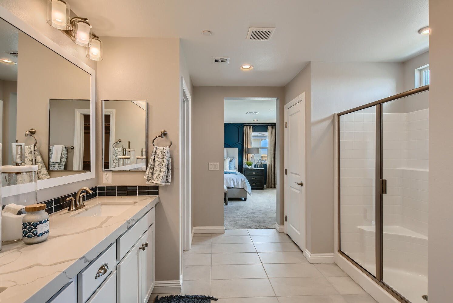 A bathroom with a glass shower.