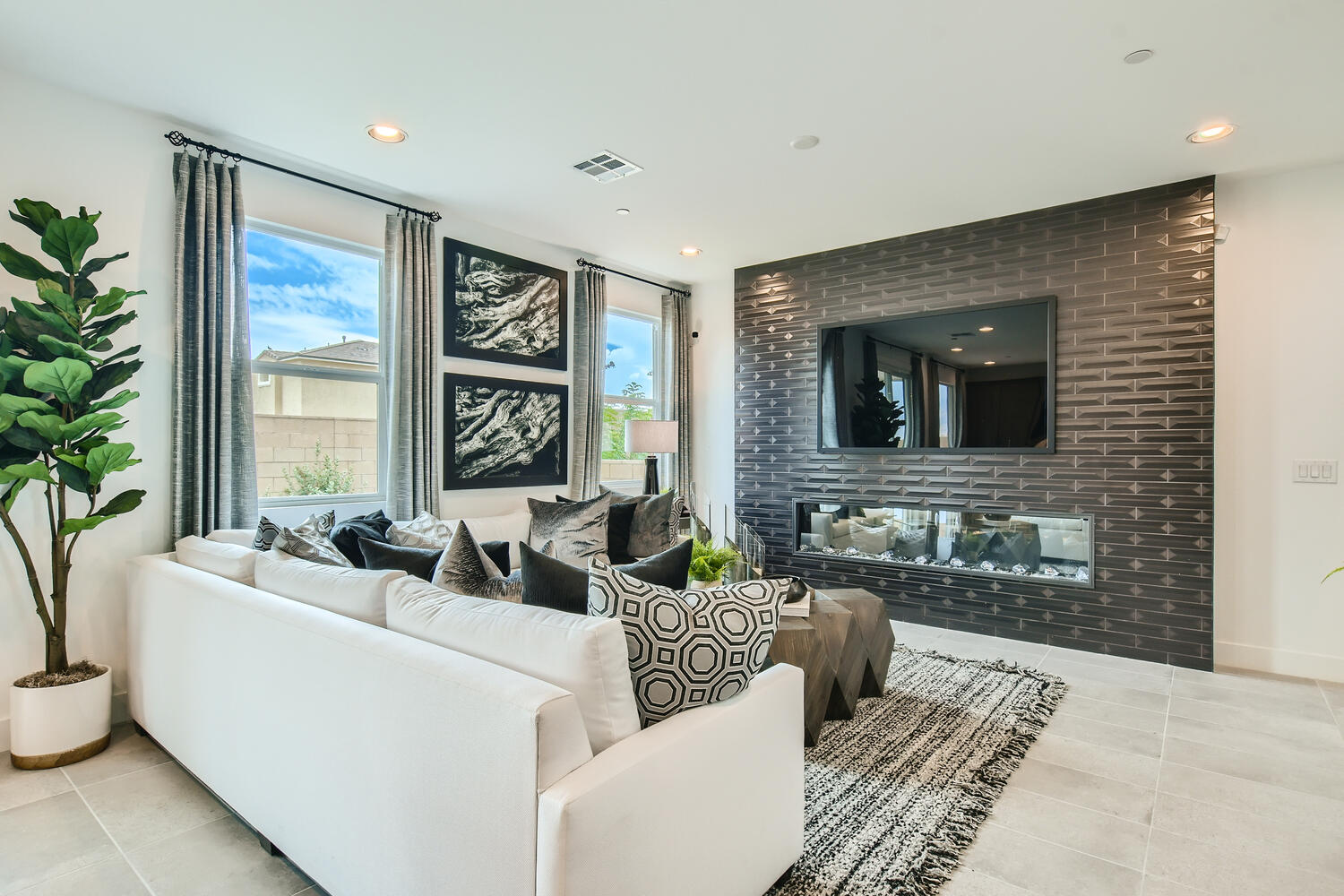 A living room with a fireplace.