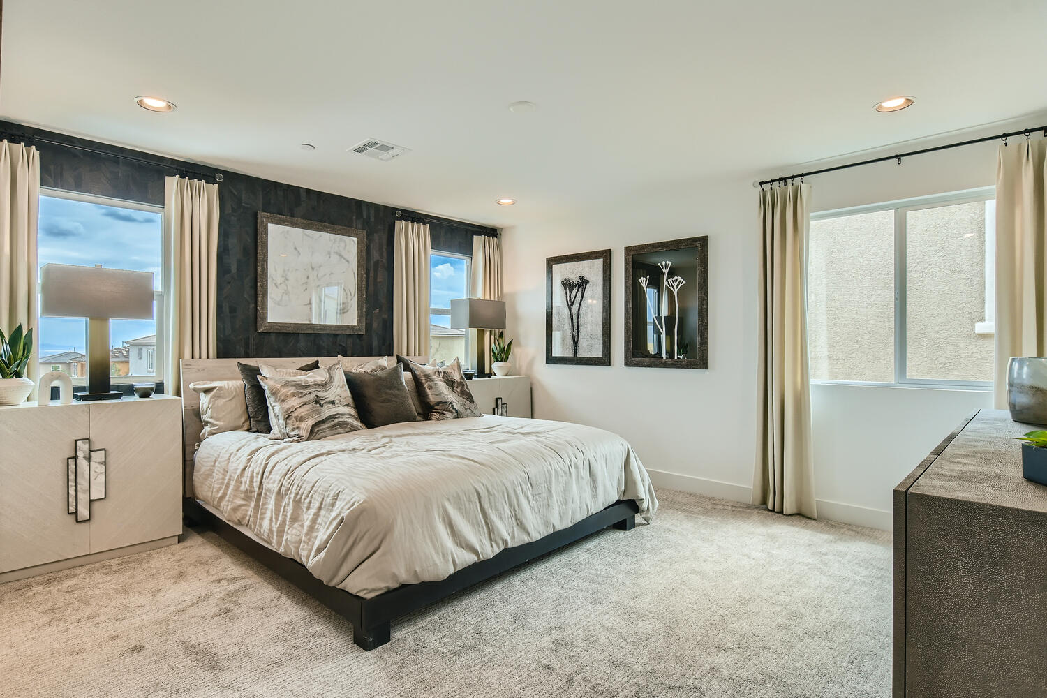 A bedroom with a large bed.