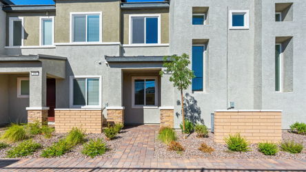 A building with a brick patio.