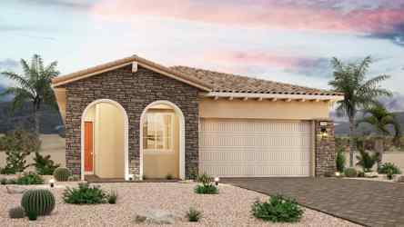 A house with a garage and palm trees.
